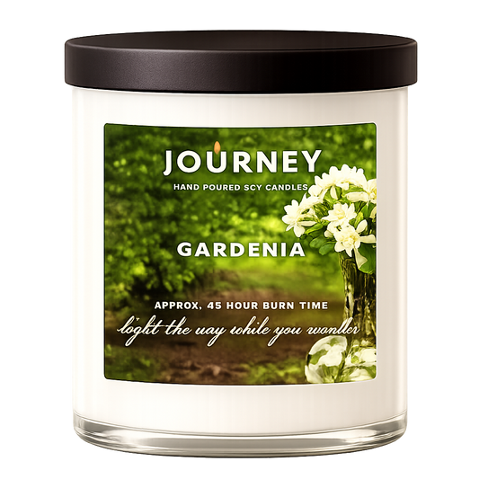 Candle with 'Journey' and 'Gardenia' text on a white background